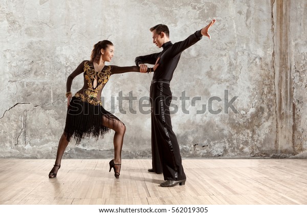 Dance beautiful couple dancing ballroom\
dancing on wall\
background