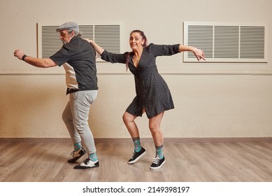 Dance Couple Doing A Lindy Hop Dance Move