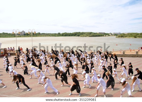 Dance flash\
mob on the river-bank in the city center.\
Date: 26.06.2011\
Place:\
Omsk City  in West\
Siberia
