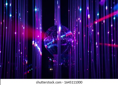 Dance Floor Disco Night With A Mirror Ball Symbol Of Fun And Party In A Nightclub Or Dance Club With Glowing Stage Lights And Reflections, Blue, Violet, Purple