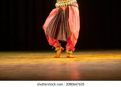 Dance Form Indian Classical Feet With Ghungru. Dance Pose, Shot From A Live Dance Performance. Indian Classical Dance Odissi 