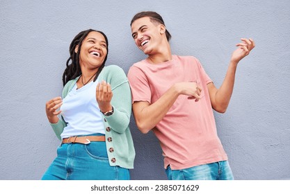 Dance, funny and interracial couple with air guitar on a wall for bonding, fun and playful in the city. Smile, laughing and black woman with a man playing an imaginary instrument for comedy together - Powered by Shutterstock