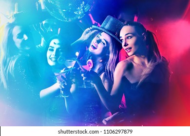Dance party with group people dancing. Women and men have fun in night club. Back light on girls hair. People in brilliant suits. Toning and blur for background. Youth trends. - Shutterstock ID 1106297879