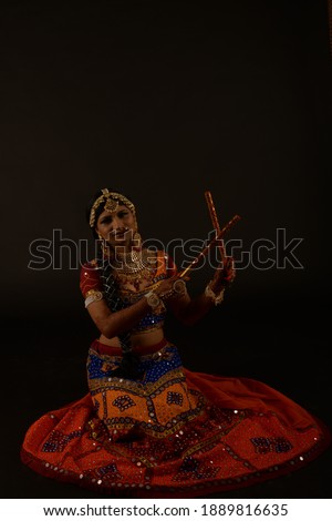 Dance poses of western India folk dance Garba performed during festival Navaratri Dussehra to celebrate the festival