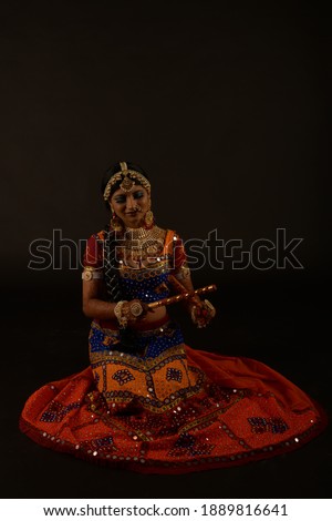 Dance poses of western India folk dance Garba performed during festival Navaratri Dussehra to celebrate the festival