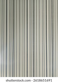 A dance of vertical lines, where simplicity becomes elegance. The repetition creates rhythm, turning an ordinary ceiling into a mesmerizing pattern of endless possibilities