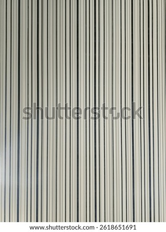 A dance of vertical lines, where simplicity becomes elegance. The repetition creates rhythm, turning an ordinary ceiling into a mesmerizing pattern of endless possibilities