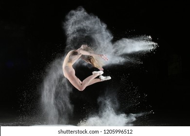 Dancer in an art dancing with flour