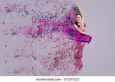 Dancer with disintegrating scarf. Abstract vision. Photo manipulation
