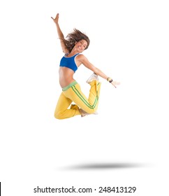 A dancer jumps in a zumba choreography