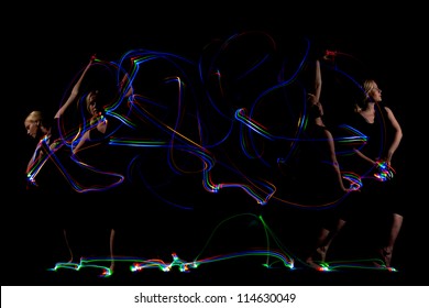 Dancer Light Painting Abstract Colorful Swirls On Black Background