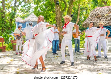 Dancers In Costumes And Musicians Perform Traditional Cuban Folk Dance. Cuba, Spring 2018