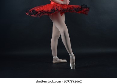 Dancers Legs With Vibrant Red Tutu