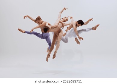 Dancers in mid-air, exercising control and precision, their leaps creating beautiful visual rhythm. against white studio background. Concept of music and dance, modern and classical art, movement. - Powered by Shutterstock