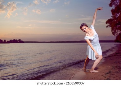 Dancing Asian Ballet Dancer At Water Shorefront