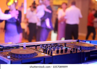 Dancing couples during party or wedding celebration 