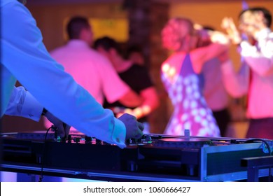 Dancing couples during party or wedding celebration 