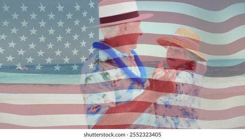 Dancing elderly couple on beach over American flag image. Senior, patriotism, love, happiness, freedom, leisure - Powered by Shutterstock