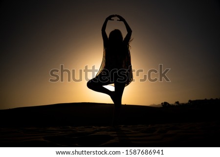 Dancing Female Silouette During Sunset