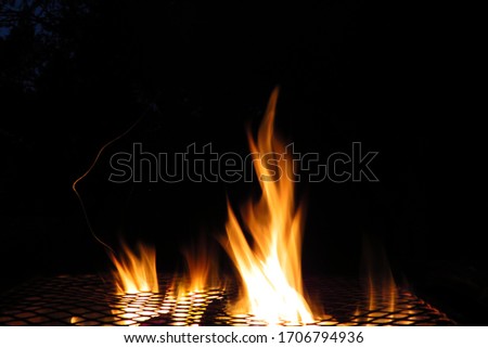 Dancing flames off a campfire during lockdown.
