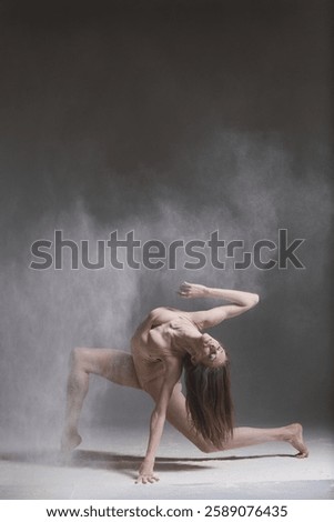 Dancing in flour dancer posing on a studio background 