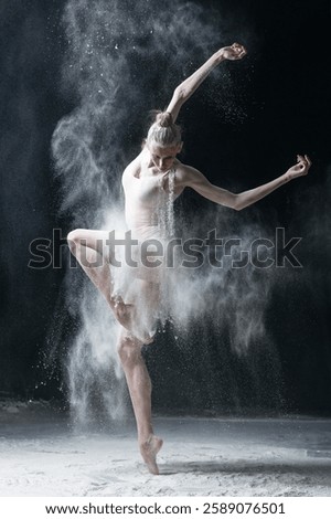 Dancing in flour dancer posing on a studio background 