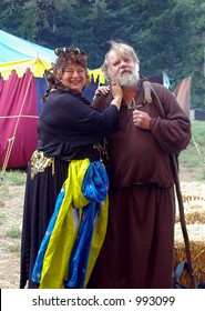 A Dancing Girl Tempts A Monk At A Renaissance Fair