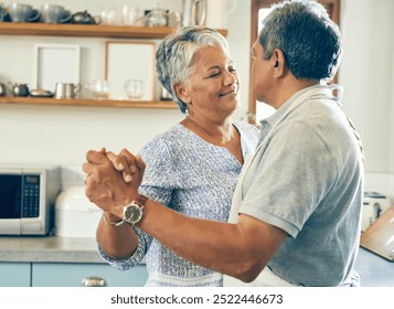 Dancing, happy and senior couple in kitchen for bonding, loving relationship and romance together in home. Retirement, marriage and mature man and woman with food for cooking meal, lunch and dinner - Powered by Shutterstock