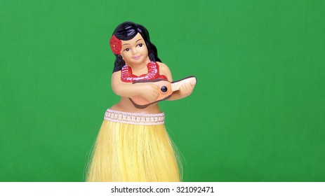 Dancing Hula Girl Doll Against A Green Screen