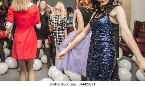 Dancing People Having Fun At The Party. No Face. Unrecognizable Person. Women Dancing At The Night Club.