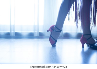 Dancing Shoes Feet And Legs Of Female Ballroom And Latin Salsa Dancer Dance Teacher In Dance School Rehearsal Room Class.