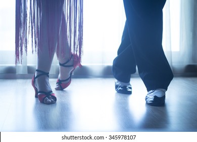 Dancing Shoes Feet And Legs Of Female And Male Couple Ballroom And Latin Salsa Dancer Dance Teacher In Dance School Rehearsal Room Class.