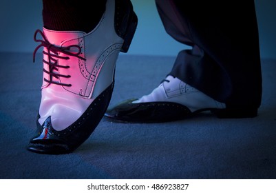 Dancing shoes feet of male ballroom, latin, salsa and swing dancer