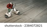Dancing tango stilettos shoes with a rose on wooden floor with text space, panoramic banner image.