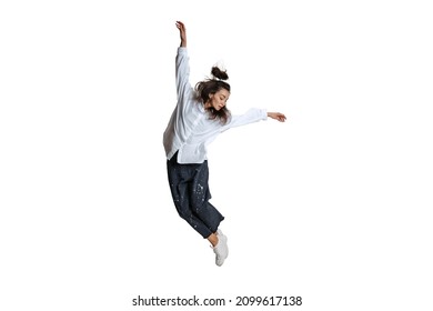 Dancing. Young woman in casual wear moving dynamically isolated on white background. Flexible female ballet, contemporary dancer weightless moves. Art, motion, action, flexibility, inspiration concept - Powered by Shutterstock