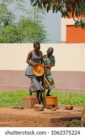 Dangbo Benin November 17 2015  Girls Pumping Water From The Well