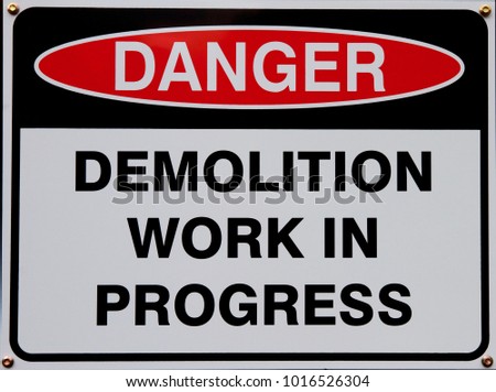 Danger: Demolition work in progress sign.