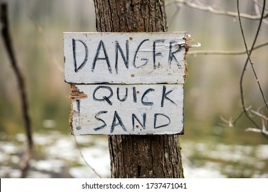 Danger Quick Sand, Quicksand Warning Sign. 