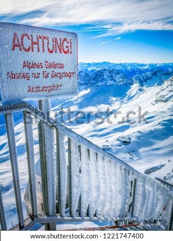 Danger sign on  frostbitten  stairs