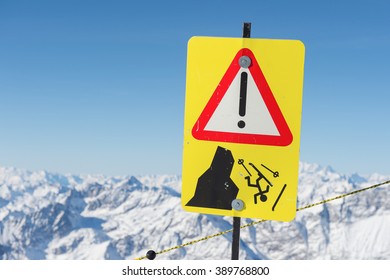 Danger Sign On Ski Slopes In Winter Mountains