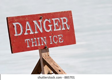 Danger Thin Ice - Warning Sign By A Lake