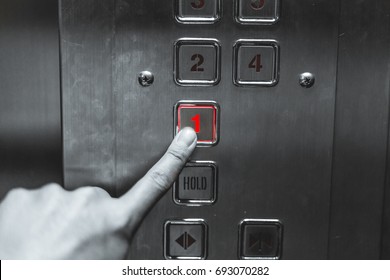 The danger of using elevators. Finger press elevator 1st floor