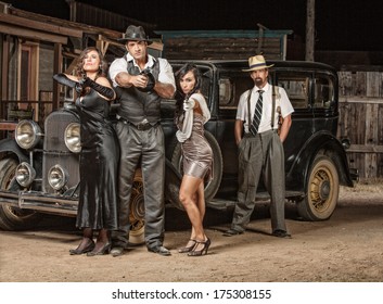 Dangerous 1920s Vintage Gangsters Outside With Weapons