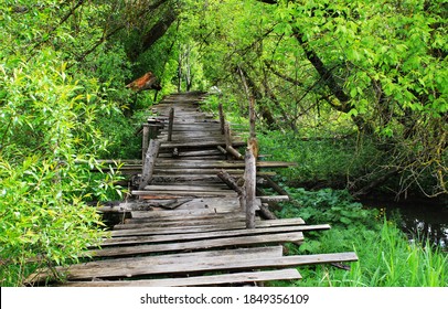 Dangerous If Broken Wooden Bridge On Foot 