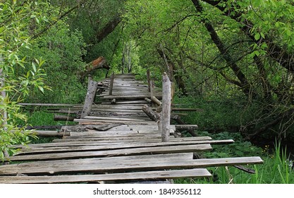 Dangerous If Broken Wooden Bridge On Foot 