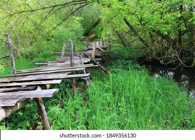 Dangerous If Broken Wooden Bridge On Foot 