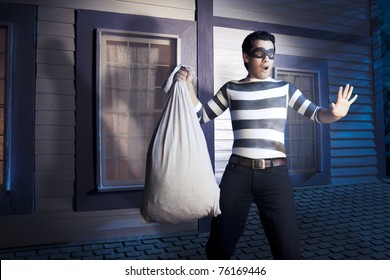 Dangerous Burglar About To Enter House