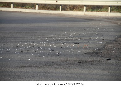 Dangerous Place On A Road With Debris After A Car Accident