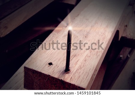 Dangerous reverse up of nail from timber