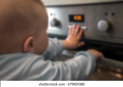 Dangerous Situation, The Child Is Playing With An Electric Stove. The Child Plays Near A Hot Stove.